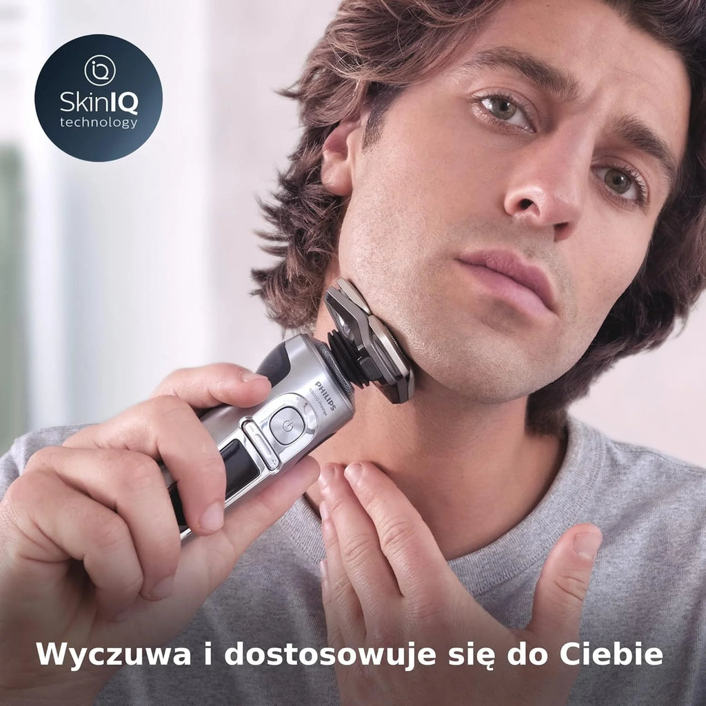 Golarka elektryczna Philips Series 9000 do golenia na mokro i sucho z technologią SkinIQ, podkładką ładującą, trymerem do nosa i brody, wkładem czyszczącym (Model SP9885/35)
