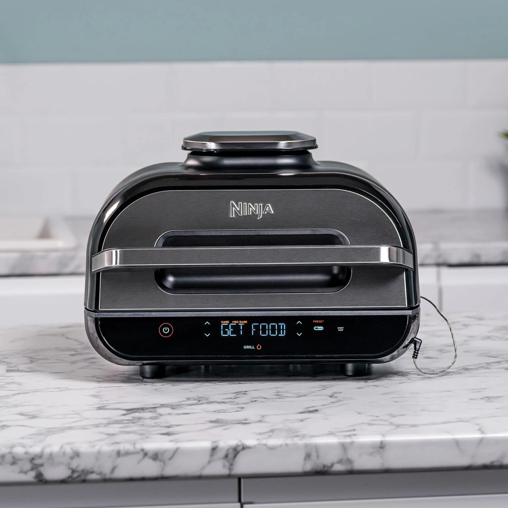 Ninja Foodi MAX PRO Grill, płaska płyta i frytkownica beztluszczowa z cyfrową sondą kuchenną i termometrem, 3,8 l, 7 funkcji gotowania w 1, części można myć w zmywarce, srebrno/czarny, AG651EU