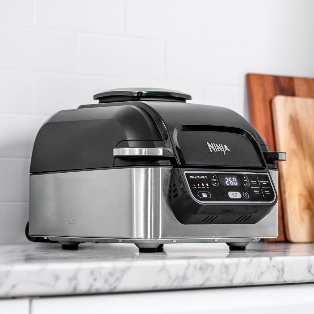 Ninja Foodi MAX PRO Grill, płaska płyta i frytkownica beztluszczowa z cyfrową sondą kuchenną i termometrem, 3,8 l, 7 funkcji gotowania w 1, części można myć w zmywarce, srebrno/czarny, AG651EU